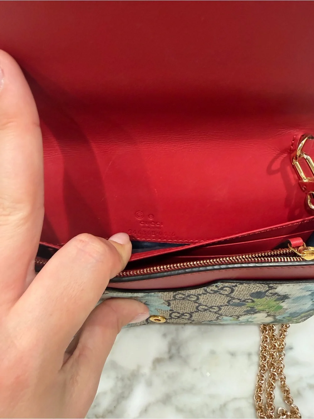 Gucci blooms GG supreme wallet on chain
